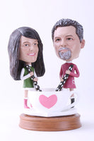 Couple Sharing a Drink Bobblehead